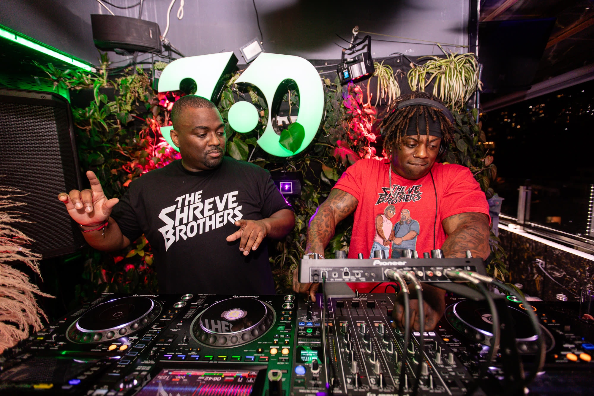The Shreve Brothers DJing together in matching Shreve Brothers tees